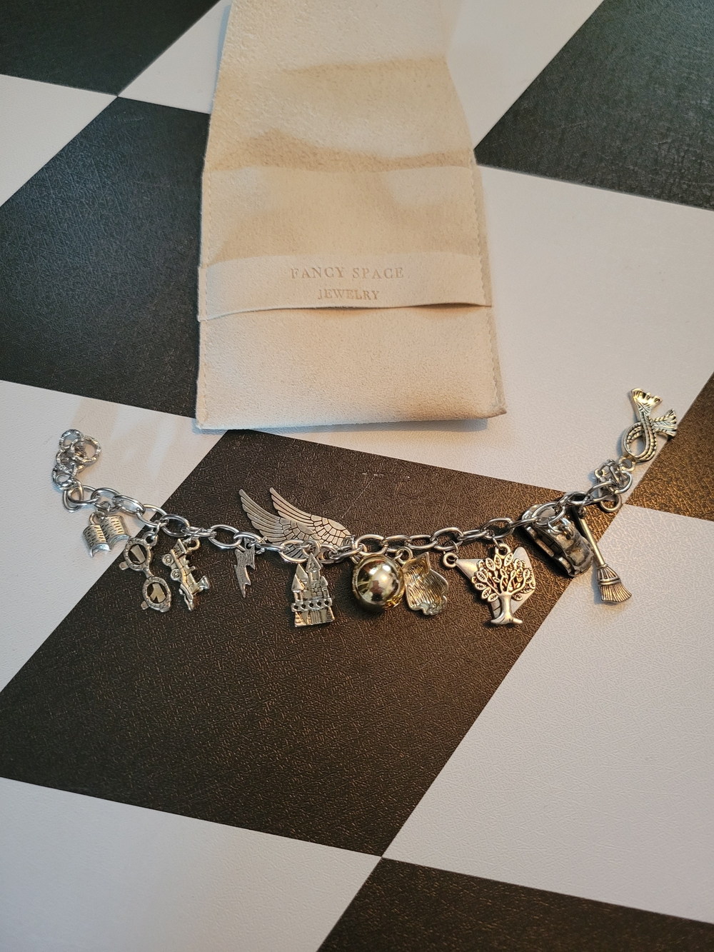 Hot Topic Harry Potter  Silver Charm Bracelet with Mixed Dangling Charms